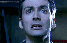 a close up of a man 's face with the hashtag @itsscottiesstark on the bottom right