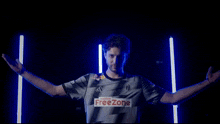 a man wearing a shirt that says free zone