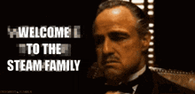 a man with a ring on his finger is talking on a phone with the words welcome to the steam family below him
