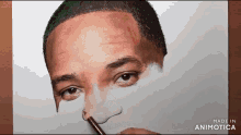 a drawing of a man 's face is being made by animatica
