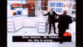 two men are standing in front of a sign that says dear viewers