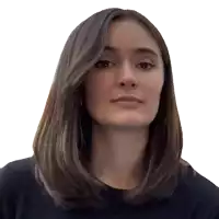 a woman with long brown hair is wearing a black sweater