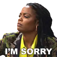 a woman with dreadlocks says i 'm sorry on a white background