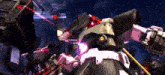 a robot with a red light on it 's head is fighting another robot .