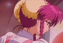a close up of a girl with pink hair wearing a yellow hat