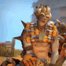 a man with a beard and horns is holding a bunch of bombs on his chest .