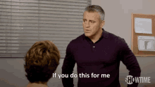 a man in a purple shirt is talking to a woman and says if you do this for me .