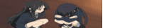a girl with long black hair is kneeling next to another girl