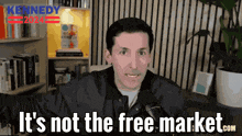 a man in a black jacket says it 's not the free market.com