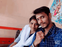 a man and woman are posing for a picture with a b612 watermark on his shirt