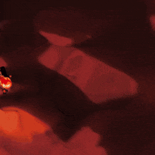 a painting of a man and woman kissing with a fire coming out of his head