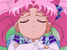 a girl with pink hair has her eyes closed and a sad look on her face