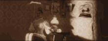 a woman in a white dress is sitting in a room holding an umbrella and a lamp .