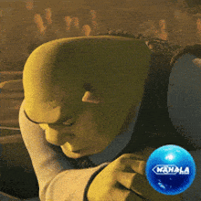 shrek is holding a blue ball that says wanda on it