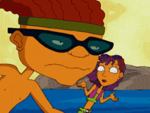 a cartoon character wearing sunglasses giving a thumbs up next to a girl in a bikini