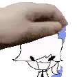 a hand is holding a piece of paper over a cartoon character 's face .