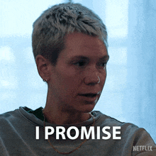 a woman with short hair says i promise