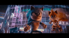 sonic the hedgehog and tails the cat are standing in front of a building