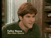 a man in a green shirt with the words falha nossa meu bem querer