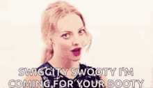 a woman is making a funny face and saying swiggity swooty i 'm coming for your booty