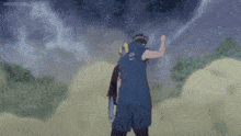 a man is holding another man 's head with a glowing hand .