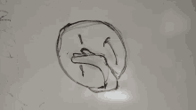 a drawing of a face with a hand on it