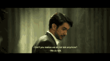 a man in a suit says " don t you realize we do not talk anymore we do talk "