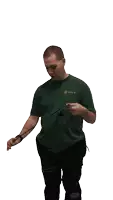 a man wearing a green shirt that says ' volvo ' on the front