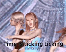 a girl in a blue dress with the words time is ticking ticking below her