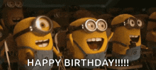 a group of minions are standing next to each other and laughing and saying happy birthday .