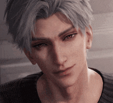 a close up of a man 's face with grey hair