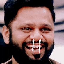 a man with tears coming out of his nose