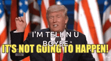 donald trump is giving a speech in front of american flags and says i 'm tell n u boyee