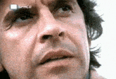 a close up of a man 's face with the word space on the bottom right