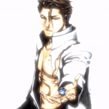a man without a shirt is holding something in his hands