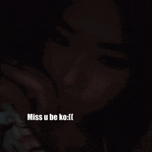 a picture of a woman with the words miss u be ko