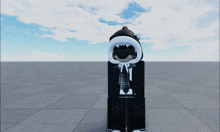 a person wearing a shark hoodie stands in a empty space