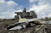 a military vehicle with a yellow sticker that says no apathch