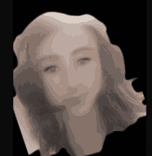 a blurred image of a woman wearing headphones