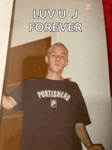 a man wearing a shirt that says portishead p