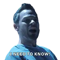 a man with a beard and a blue shirt says i need to know