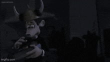 a cartoon character is holding a remote control in front of a giant monster .