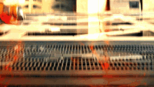 a blurred image of a keyboard with a few lines visible