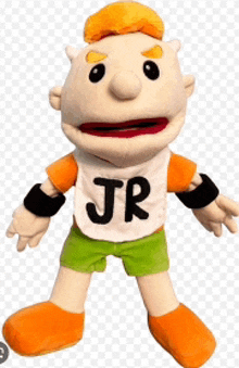 a stuffed toy with jr on his shirt