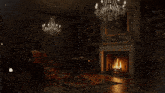 a living room with a fireplace and chandeliers