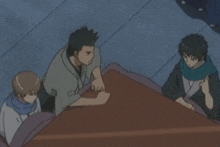 a man in a kimono is laying on a bed with two other men