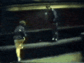 a blurry picture of two people walking in front of a sign that says ' xerox '