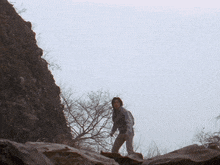 a large rock is being thrown into the air with a white background