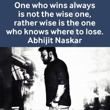 a black and white photo of a man with a quote by abhijit naskar