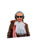 a man wearing headphones giving the peace sign